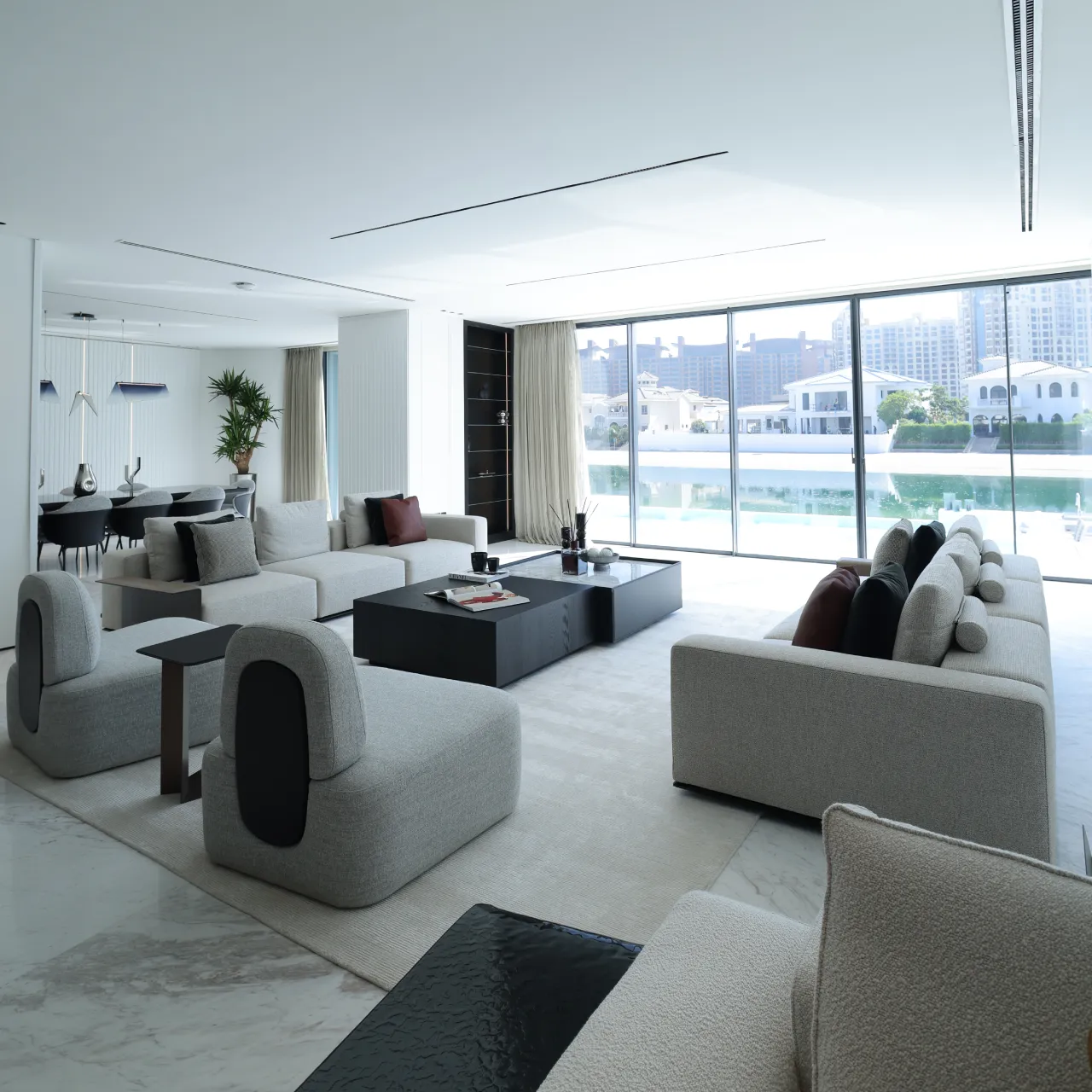 A luxury Palm Jumeirah house remodeling project with open plan living room and kitchen