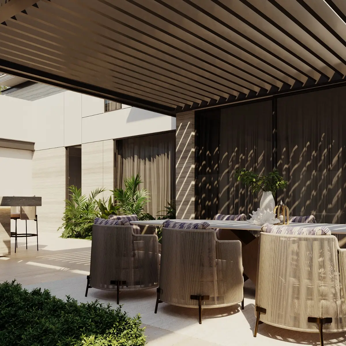 A modern Dubai house yard landscape design with a pergola and an outdoor dining set in front of the villa