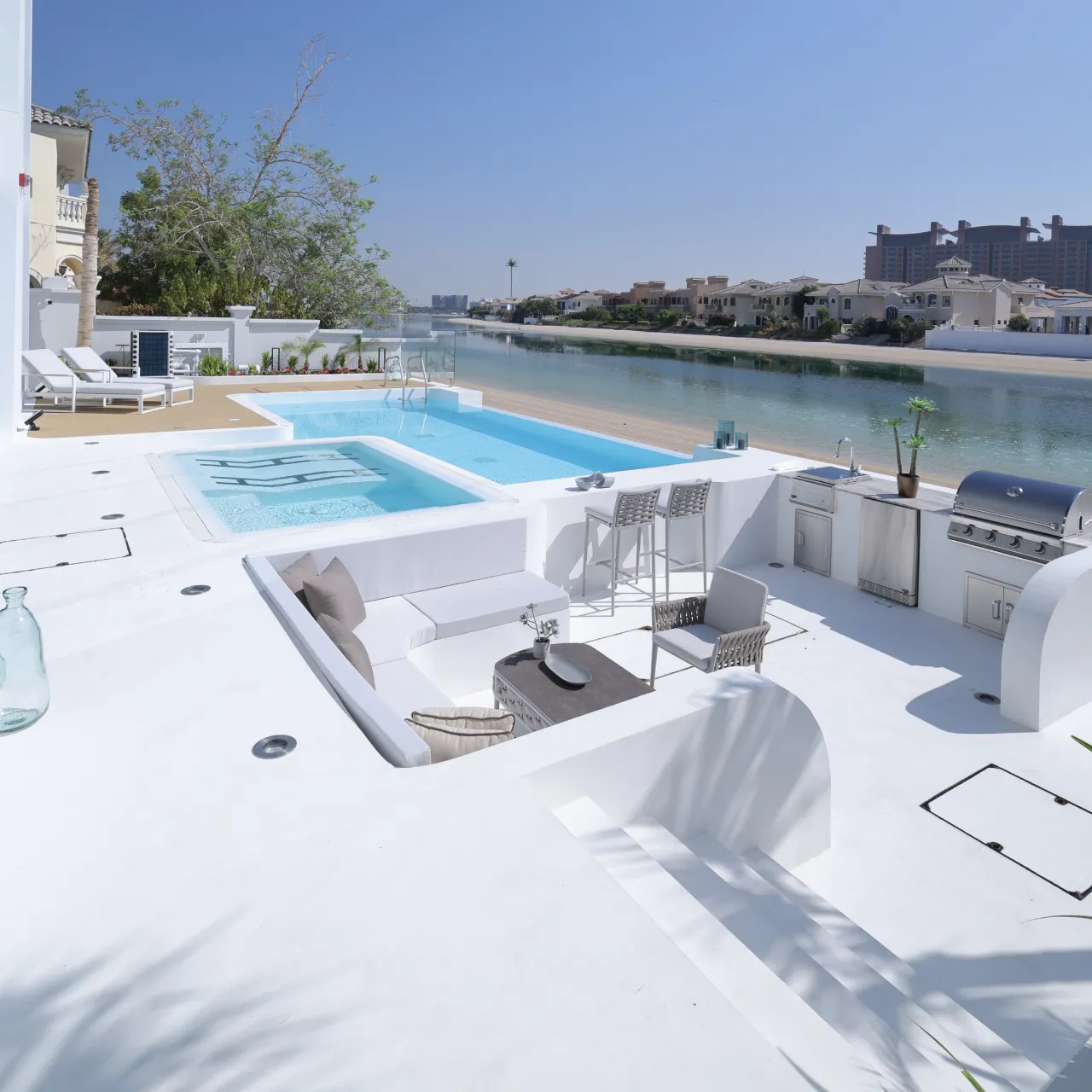 A whole house remodeling of a Palm Jumeirah villa with a backyard and swimming pool upgrade