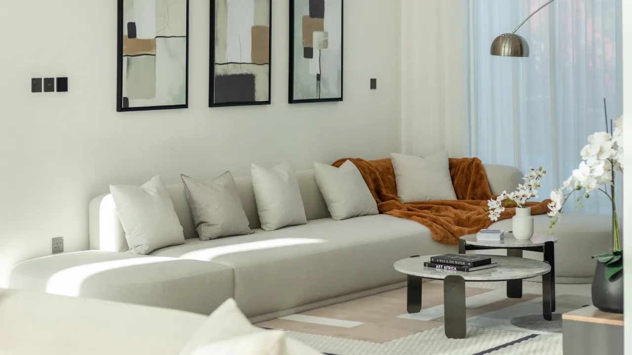 Jumeirah Islands home interior design with soft lounge seating and abstract wall art Villa interior design with soft lounge seating and abstract wall art