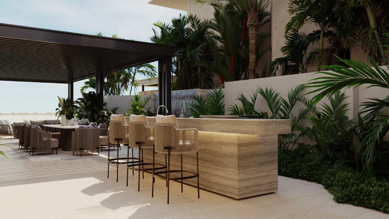Modern landscape design in Dubai with an outdoor bar counter in travertine and a pergola