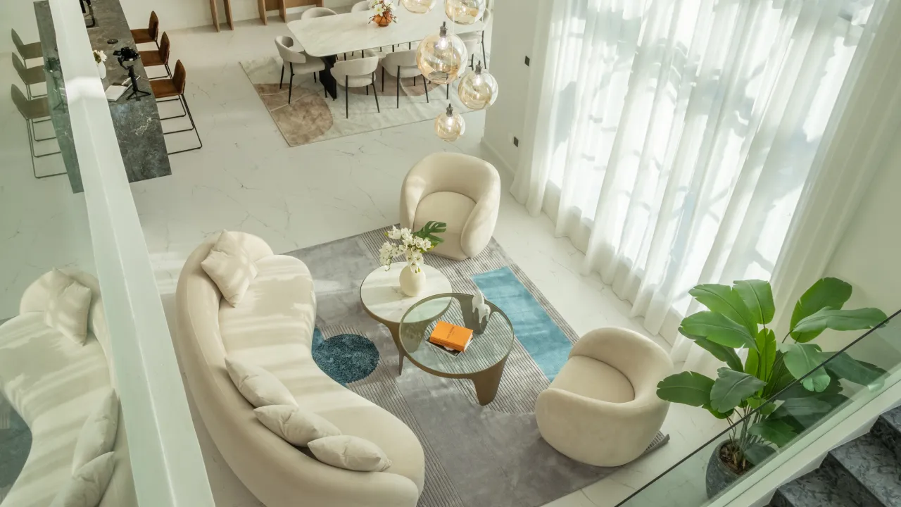 Villa renovation Jumeirah Islands with double height living room and connected dining area Villa renovation with double height living room and connected dining area